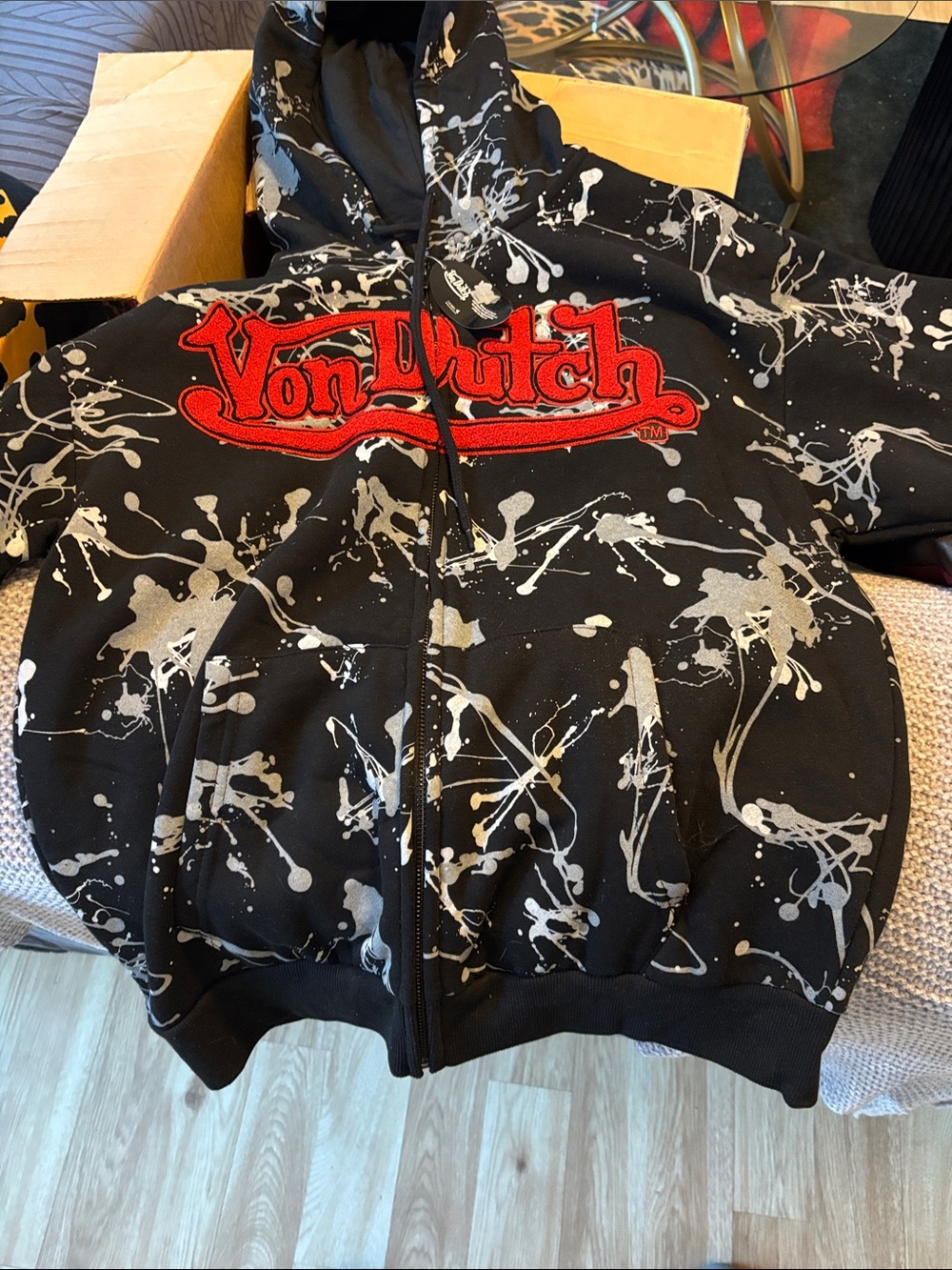Von Dutch Black Hoodie with Silver Paint-Splatter and Red Logo